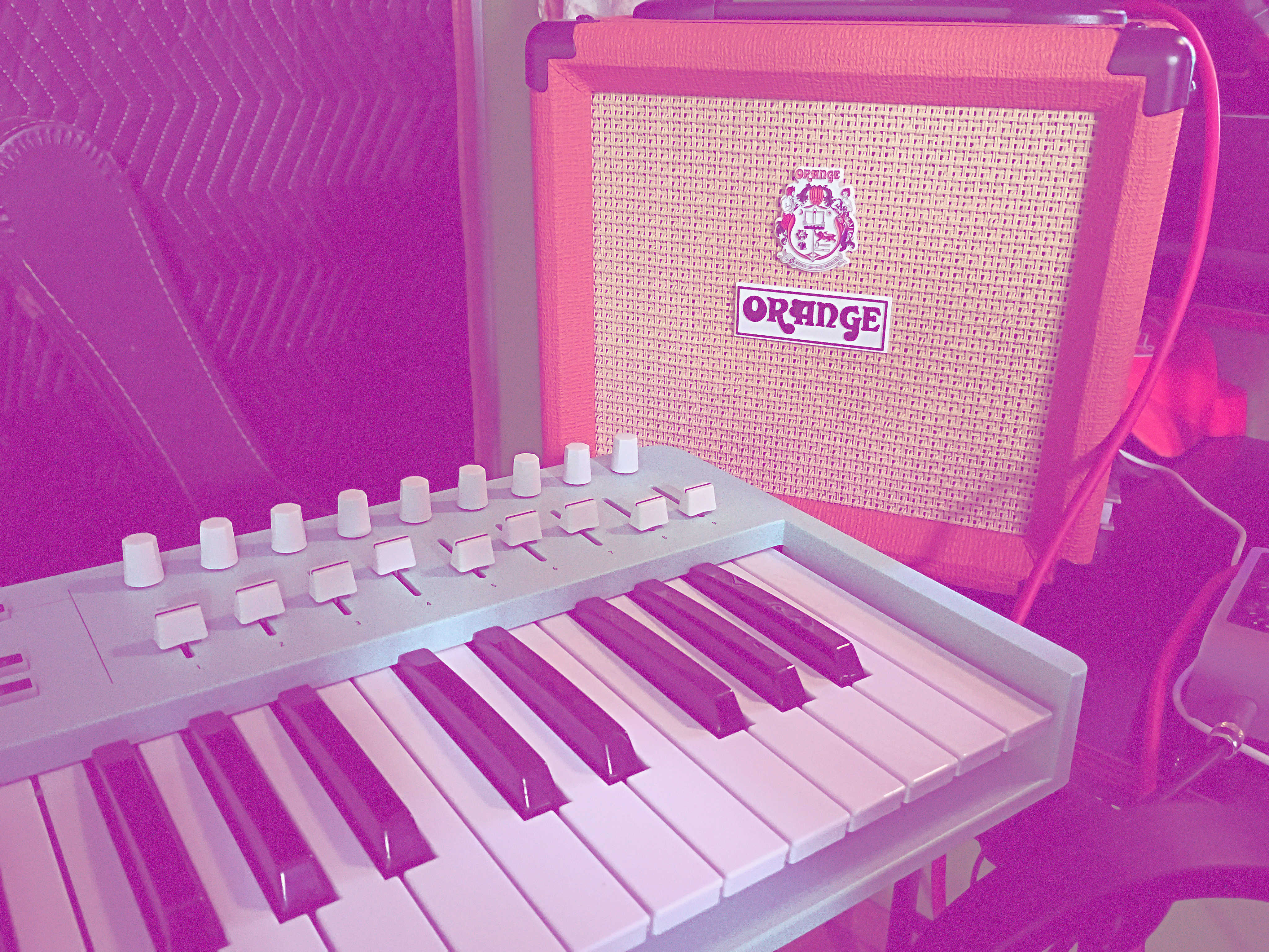 Yamidotmp3 studio setup with synths and guitar for alt-electronic music