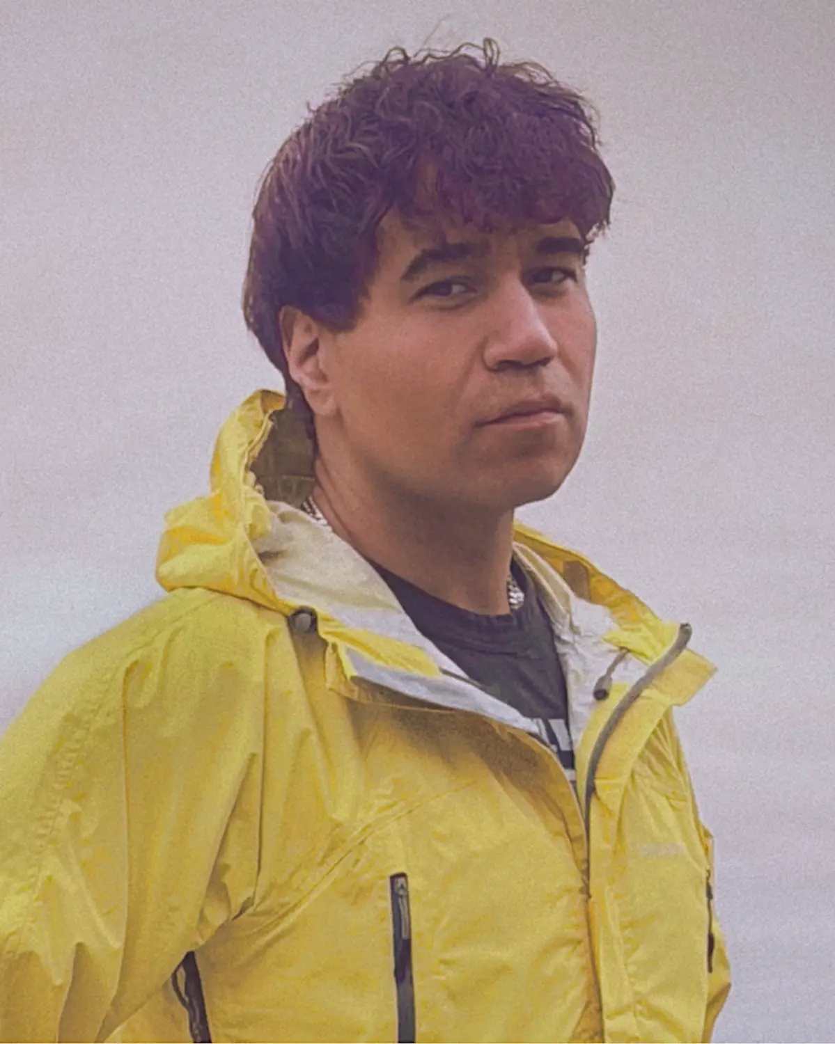 Yamí in a yellow jacket
